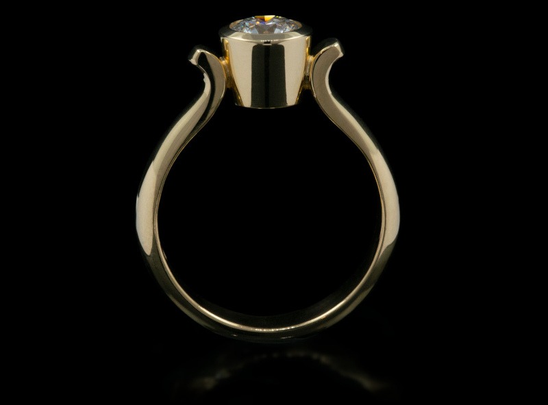 Rudolf Heltzel 18ct yellow gold solitaire engagement ring with bezel set diamond
