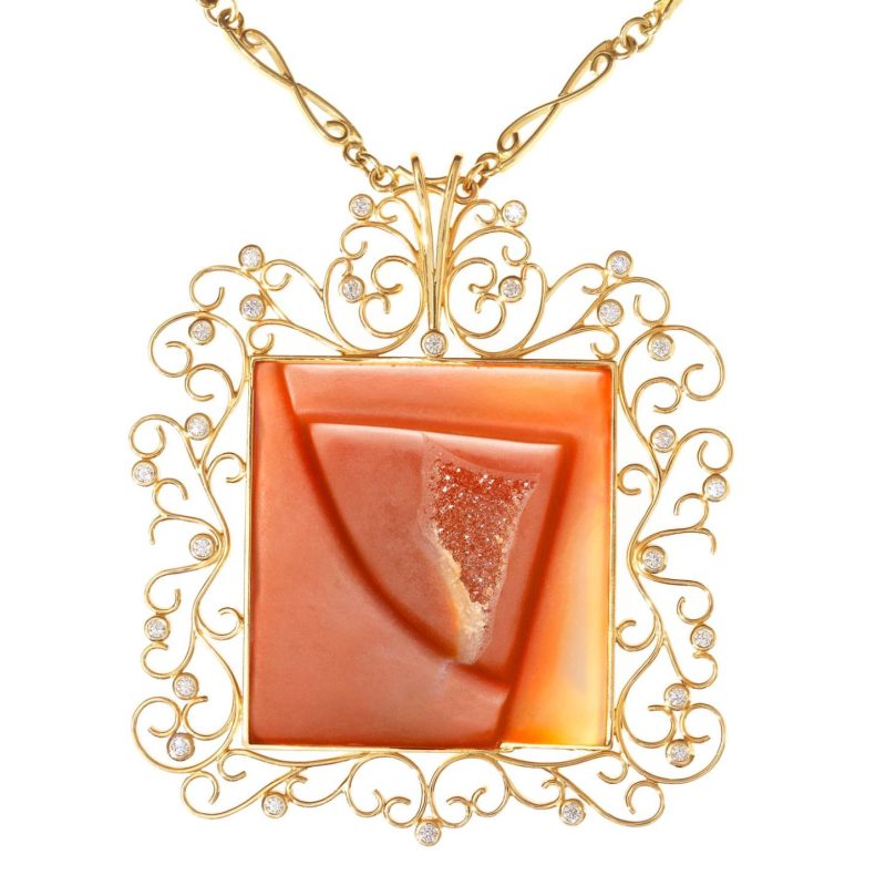 Rudolf Heltzel 18ct yellow gold pendant set with red carved carnelian and diamond