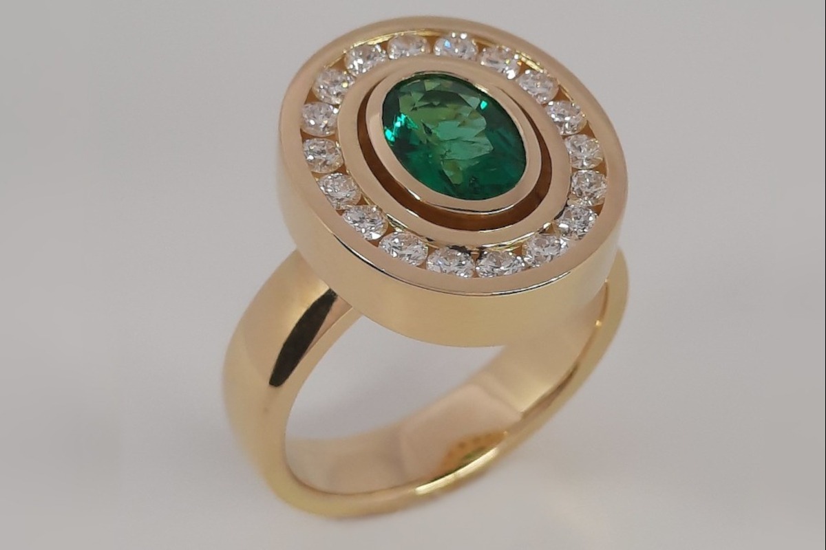 Rudolf Heltzel Diamond Surrounded Oval Emerald 18ct Yellow Gold Engagement Ring