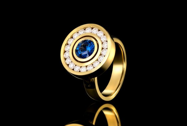 Rudolf Heltzel Diamond Surrounded Sapphire 18ct Yellow Gold Engagement Ring