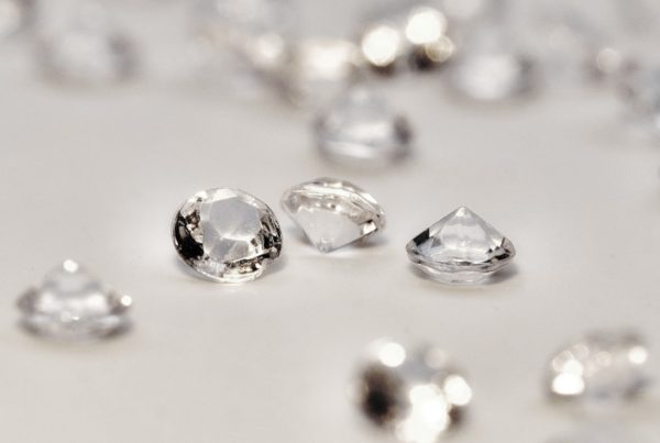 Round cut diamonds on a plain white background