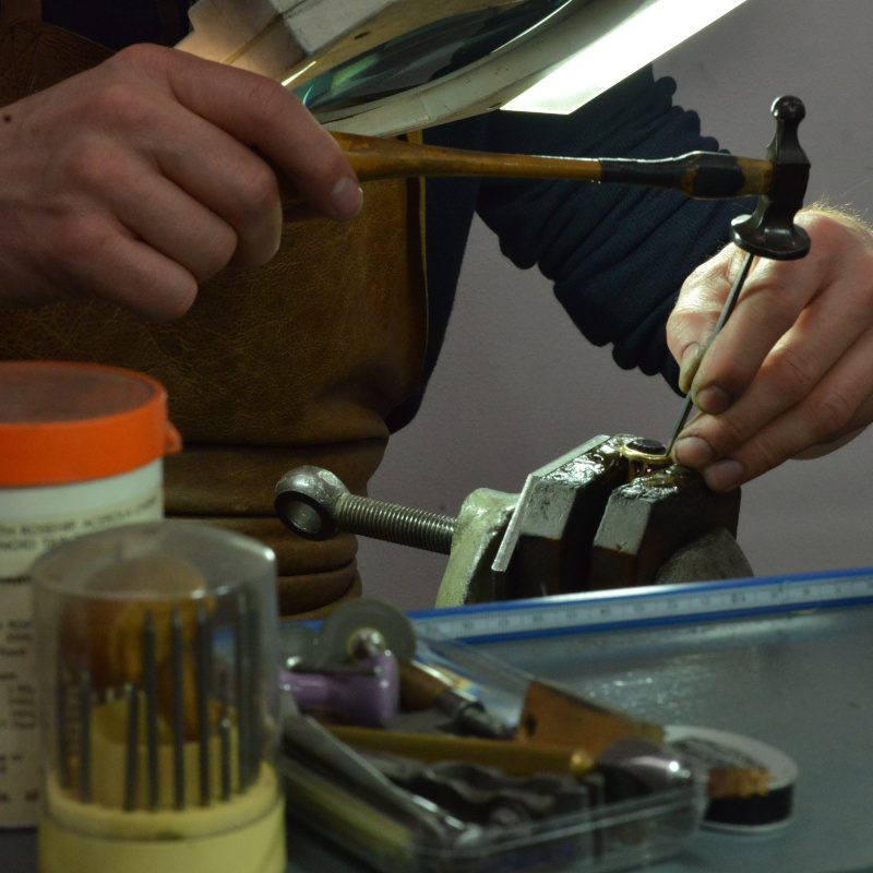 Gemstones being set in a custom ring in Rudolf Heltzel's workshop in Kilkenny City