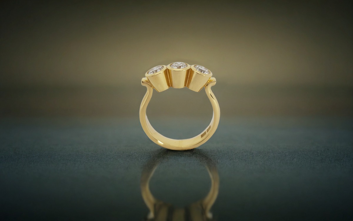 3 Stone Bezel Set Diamond and Yellow Gold Engagement Ring