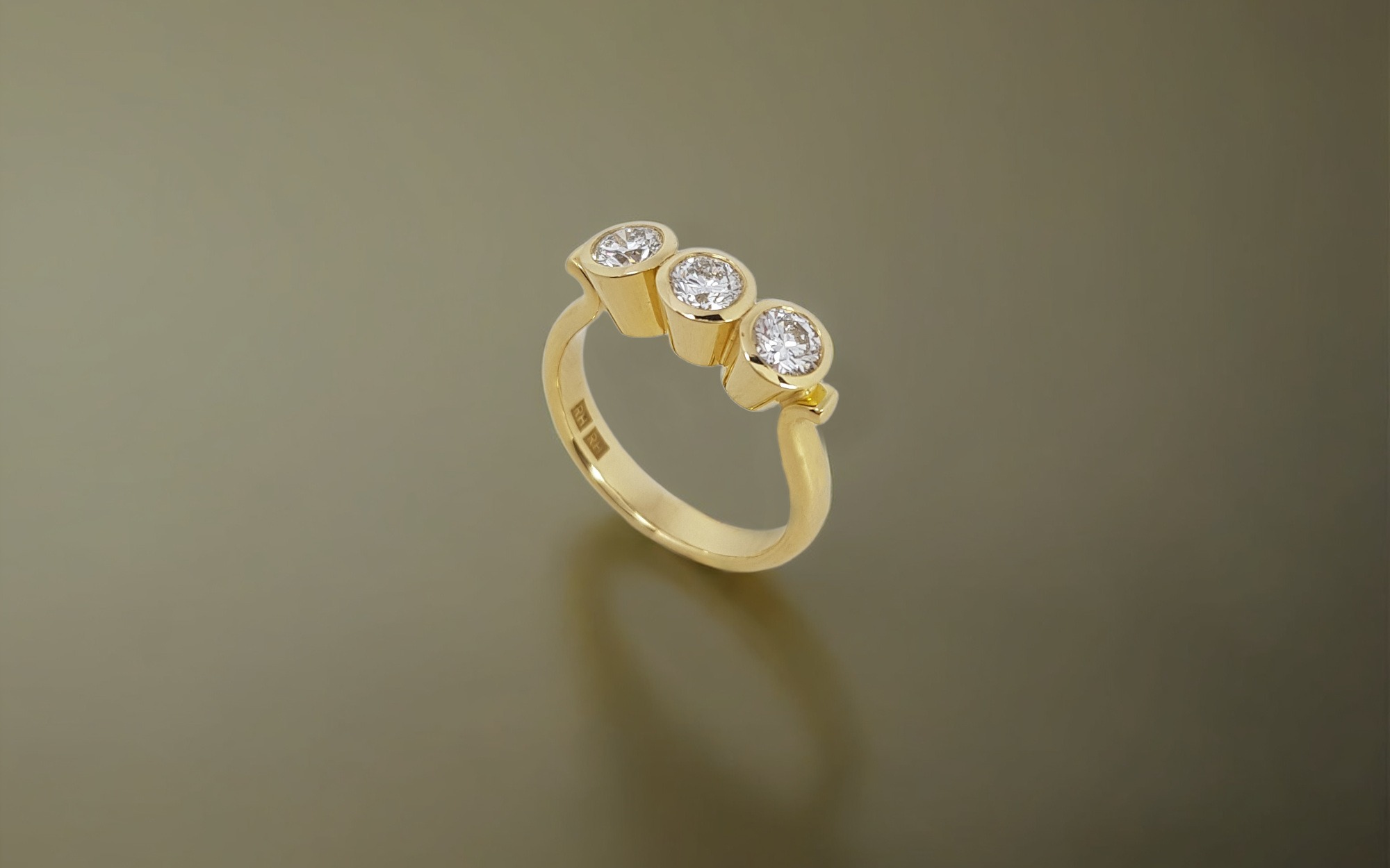 3 Stone Bezel Set Diamond and Yellow Gold Engagement Ring