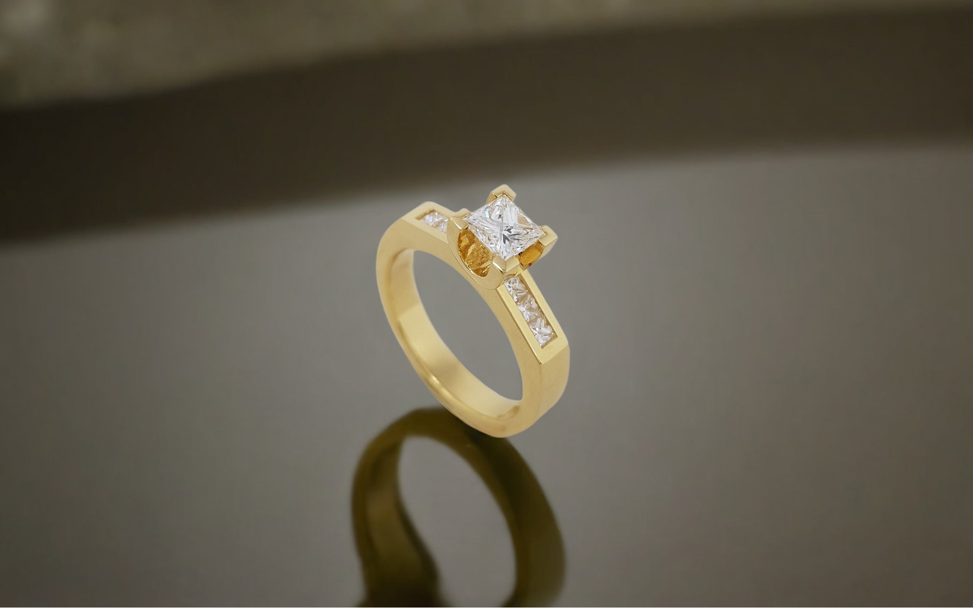 Rudolf Heltzel Princess Channel Set Diamond And Yellow Gold Engagement Ring