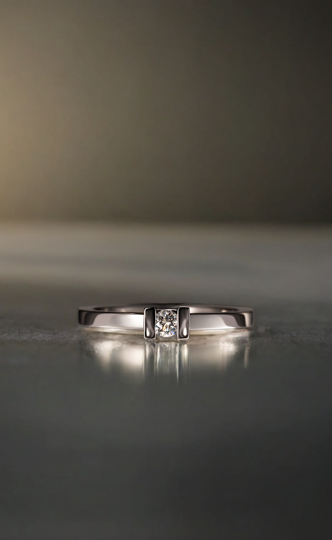 Rudolf Heltzel UShaped Solitaire Diamond engagement Ring In Platinum