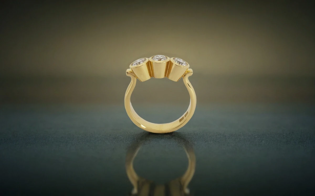 Rudolf Heltzel 3 Stone Bezel Set Engagement Ring In Yellow Gold